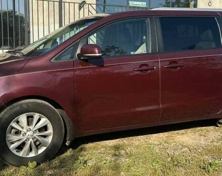 Красный Киа Седона, объемом двигателя 3.34 л и пробегом 105 тыс. км за 14000 $, фото 1 на Automoto.ua