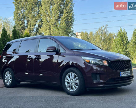 Красный Киа Седона, объемом двигателя 3.34 л и пробегом 126 тыс. км за 14990 $, фото 2 на Automoto.ua