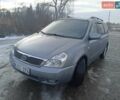 Серый Киа Седона, объемом двигателя 3.5 л и пробегом 215 тыс. км за 11800 $, фото 1 на Automoto.ua