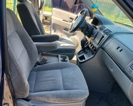 Синий Киа Седона, объемом двигателя 3.5 л и пробегом 300 тыс. км за 3700 $, фото 2 на Automoto.ua