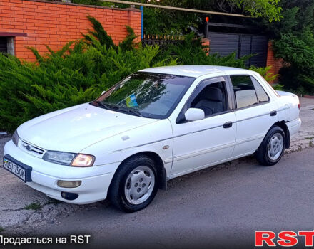 Белый Киа Сефия, объемом двигателя 1.6 л и пробегом 327 тыс. км за 1199 $, фото 2 на Automoto.ua