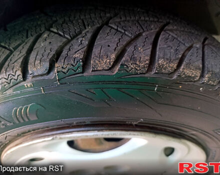 Белый Киа Сефия, объемом двигателя 1.6 л и пробегом 327 тыс. км за 1199 $, фото 13 на Automoto.ua