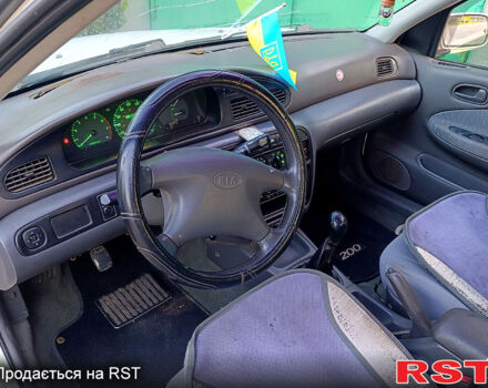 Белый Киа Сефия, объемом двигателя 1.6 л и пробегом 327 тыс. км за 1199 $, фото 5 на Automoto.ua