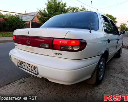 Белый Киа Сефия, объемом двигателя 1.6 л и пробегом 327 тыс. км за 1199 $, фото 4 на Automoto.ua