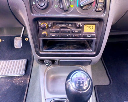 Белый Киа Сефия, объемом двигателя 1.6 л и пробегом 327 тыс. км за 1199 $, фото 7 на Automoto.ua