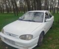 Белый Киа Сефия, объемом двигателя 1 л и пробегом 100 тыс. км за 1700 $, фото 1 на Automoto.ua