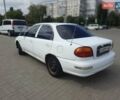 Белый Киа Сефия, объемом двигателя 1.5 л и пробегом 350 тыс. км за 1250 $, фото 4 на Automoto.ua