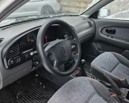 Белый Киа Сефия, объемом двигателя 1.6 л и пробегом 330 тыс. км за 2600 $, фото 3 на Automoto.ua