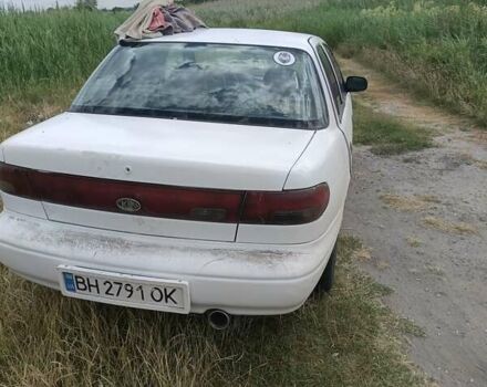Білий Кіа Сефія, об'ємом двигуна 1.5 л та пробігом 225 тис. км за 1100 $, фото 1 на Automoto.ua