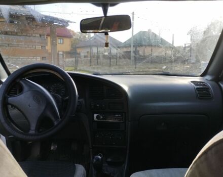 Белый Киа Сефия, объемом двигателя 1.5 л и пробегом 200 тыс. км за 1400 $, фото 1 на Automoto.ua