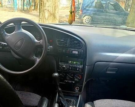 Белый Киа Сефия, объемом двигателя 1.6 л и пробегом 364 тыс. км за 2600 $, фото 1 на Automoto.ua