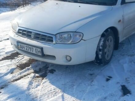 Белый Киа Сефия, объемом двигателя 0 л и пробегом 165 тыс. км за 1600 $, фото 1 на Automoto.ua