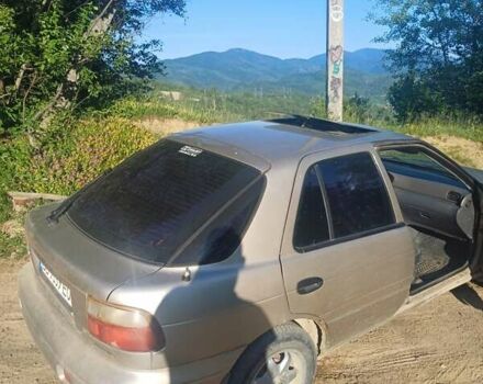 Бежевый Киа Сефия, объемом двигателя 1.5 л и пробегом 250 тыс. км за 1450 $, фото 4 на Automoto.ua