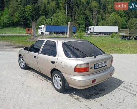 Бежевый Киа Сефия, объемом двигателя 1.5 л и пробегом 250 тыс. км за 1450 $, фото 1 на Automoto.ua