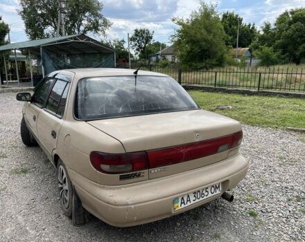 Бежевый Киа Сефия, объемом двигателя 1.5 л и пробегом 150 тыс. км за 1650 $, фото 3 на Automoto.ua