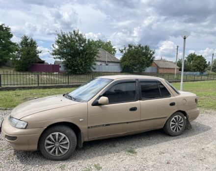 Бежевый Киа Сефия, объемом двигателя 1.5 л и пробегом 150 тыс. км за 1650 $, фото 1 на Automoto.ua
