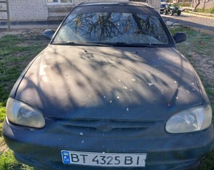 Черный Киа Сефия, объемом двигателя 1.5 л и пробегом 465 тыс. км за 900 $, фото 3 на Automoto.ua