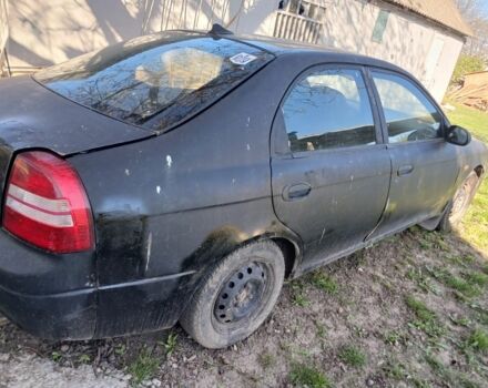 Черный Киа Сефия, объемом двигателя 1.5 л и пробегом 465 тыс. км за 900 $, фото 1 на Automoto.ua