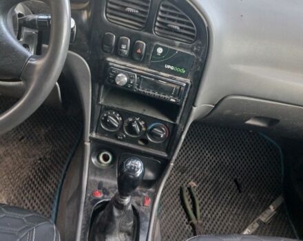 Черный Киа Сефия, объемом двигателя 1.5 л и пробегом 465 тыс. км за 900 $, фото 6 на Automoto.ua