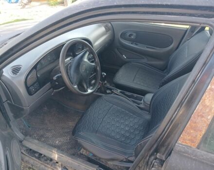 Черный Киа Сефия, объемом двигателя 1.5 л и пробегом 465 тыс. км за 900 $, фото 4 на Automoto.ua