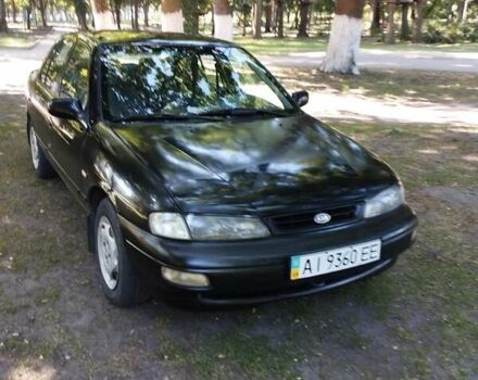 Чорний Кіа Сефія, об'ємом двигуна 1.6 л та пробігом 310 тис. км за 1300 $, фото 2 на Automoto.ua