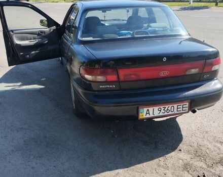 Чорний Кіа Сефія, об'ємом двигуна 1.6 л та пробігом 310 тис. км за 1300 $, фото 1 на Automoto.ua