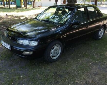 Чорний Кіа Сефія, об'ємом двигуна 1.6 л та пробігом 310 тис. км за 1300 $, фото 3 на Automoto.ua