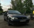 Чорний Кіа Сефія, об'ємом двигуна 1.5 л та пробігом 3 тис. км за 1350 $, фото 1 на Automoto.ua