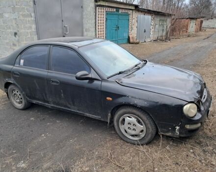 Чорний Кіа Сефія, об'ємом двигуна 1.5 л та пробігом 300 тис. км за 1308 $, фото 1 на Automoto.ua