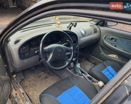 Черный Киа Сефия, объемом двигателя 1.5 л и пробегом 300 тыс. км за 1000 $, фото 5 на Automoto.ua