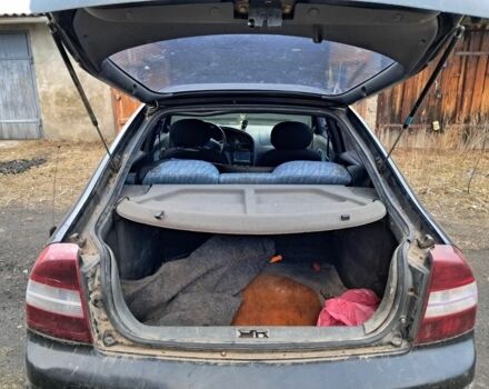 Чорний Кіа Сефія, об'ємом двигуна 1.5 л та пробігом 300 тис. км за 1308 $, фото 3 на Automoto.ua