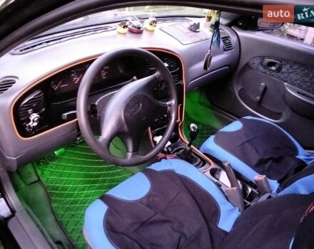 Чорний Кіа Сефія, об'ємом двигуна 1.5 л та пробігом 350 тис. км за 1200 $, фото 5 на Automoto.ua