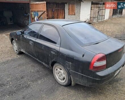 Чорний Кіа Сефія, об'ємом двигуна 1.5 л та пробігом 300 тис. км за 1200 $, фото 1 на Automoto.ua