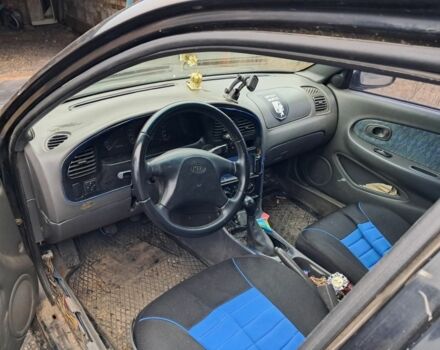 Чорний Кіа Сефія, об'ємом двигуна 1.5 л та пробігом 300 тис. км за 1308 $, фото 4 на Automoto.ua