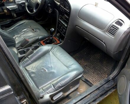 Черный Киа Сефия, объемом двигателя 2 л и пробегом 0 тыс. км за 650 $, фото 3 на Automoto.ua