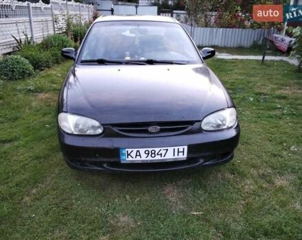 Чорний Кіа Сефія, об'ємом двигуна 1.5 л та пробігом 350 тис. км за 1200 $, фото 2 на Automoto.ua