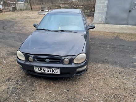 Черный Киа Сефия, объемом двигателя 1.5 л и пробегом 300 тыс. км за 1308 $, фото 1 на Automoto.ua