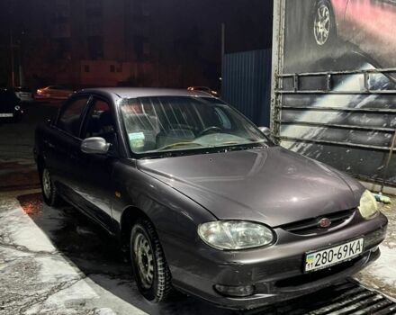 Фиолетовый Киа Сефия, объемом двигателя 1.5 л и пробегом 300 тыс. км за 2680 $, фото 2 на Automoto.ua