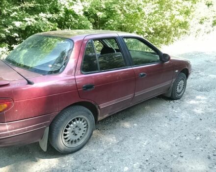 Красный Киа Сефия, объемом двигателя 1.5 л и пробегом 123 тыс. км за 850 $, фото 4 на Automoto.ua