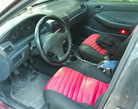 Красный Киа Сефия, объемом двигателя 1.5 л и пробегом 123 тыс. км за 850 $, фото 2 на Automoto.ua