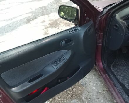 Красный Киа Сефия, объемом двигателя 1.5 л и пробегом 123 тыс. км за 850 $, фото 3 на Automoto.ua