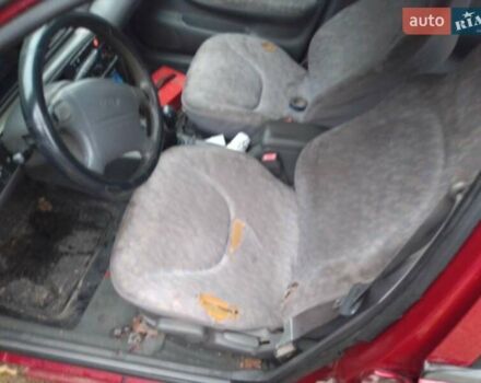 Красный Киа Сефия, объемом двигателя 1.5 л и пробегом 300 тыс. км за 1700 $, фото 11 на Automoto.ua