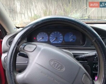 Красный Киа Сефия, объемом двигателя 1.5 л и пробегом 300 тыс. км за 1700 $, фото 9 на Automoto.ua