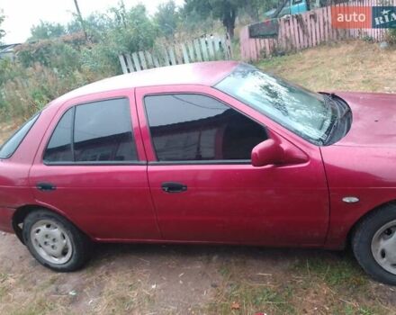 Красный Киа Сефия, объемом двигателя 1.5 л и пробегом 300 тыс. км за 1700 $, фото 3 на Automoto.ua