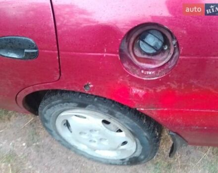 Красный Киа Сефия, объемом двигателя 1.5 л и пробегом 300 тыс. км за 1700 $, фото 6 на Automoto.ua