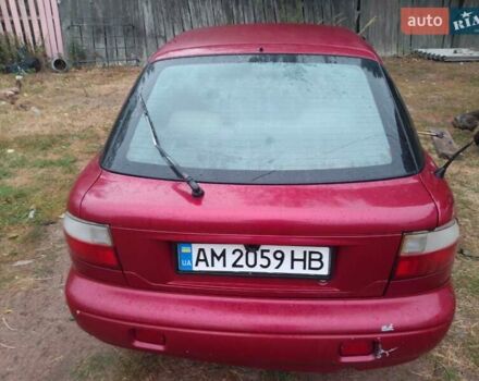 Красный Киа Сефия, объемом двигателя 1.5 л и пробегом 300 тыс. км за 1700 $, фото 4 на Automoto.ua