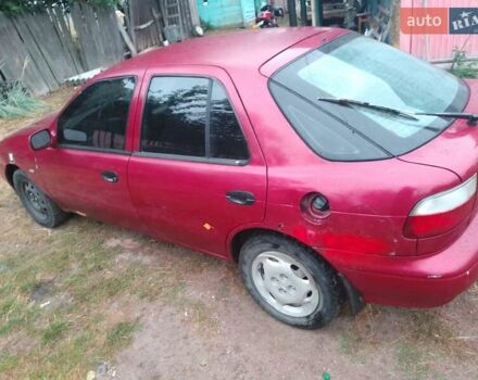 Красный Киа Сефия, объемом двигателя 1.5 л и пробегом 300 тыс. км за 1700 $, фото 5 на Automoto.ua