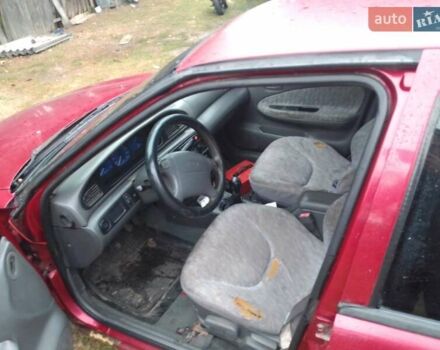 Красный Киа Сефия, объемом двигателя 1.5 л и пробегом 300 тыс. км за 1700 $, фото 8 на Automoto.ua