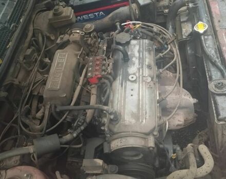 Красный Киа Сефия, объемом двигателя 1.5 л и пробегом 255 тыс. км за 1000 $, фото 3 на Automoto.ua