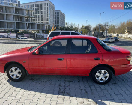 Красный Киа Сефия, объемом двигателя 1.6 л и пробегом 200 тыс. км за 1400 $, фото 4 на Automoto.ua